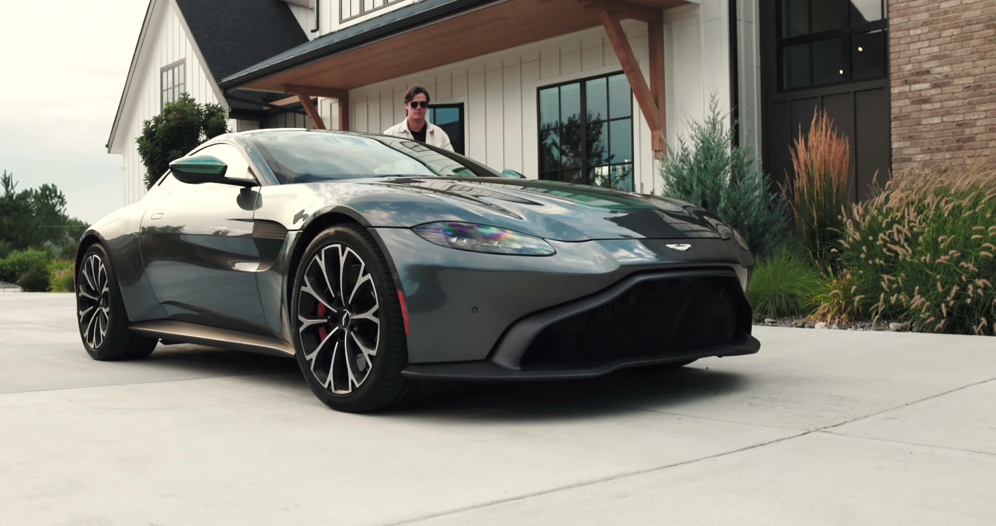 Aston Martin Vantage in the driveway — Turismo Auto Group